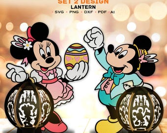 May include: A set of two Easter-themed lantern designs featuring Mickey and Minnie Mouse. The lanterns are round and have a black silhouette of Mickey and Minnie Mouse holding hands inside. Mickey Mouse is wearing a blue suit and Minnie Mouse is wearing a pink dress. Both are holding Easter eggs.