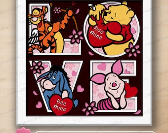 May include: A framed shadow box featuring the word "LOVE" with Disney characters. Tigger is in the "L", Winnie the Pooh in the "O", Eeyore in the "V", and Piglet in the "E". Each character holds a heart. The box has a white frame.