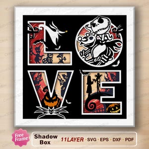 May include: A black and white shadow box with the word "LOVE" in a layered design. The letters feature characters and imagery from "The Nightmare Before Christmas", including Jack Skellington, Sally, and pumpkins. The design is set against a black background.