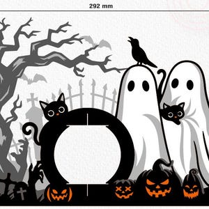 May include: A Halloween decoration with a spooky design. It features a black cat, ghosts, pumpkins, a bare tree, and a graveyard scene. The decoration is 29.2 cm wide and 20.4 cm tall.