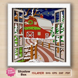 May include: A 15-layer papercraft shadow box with a winter scene. The scene features a red barn with a wreath on the door, a snow-covered path, and a wooden fence. The box is open, revealing the scene inside.