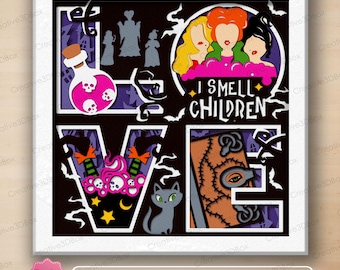 May include: A multi-layered shadow box design featuring the word LOVE with Halloween-themed illustrations including a potion bottle with skulls, three women with colorful hair, the text I SMELL CHILDREN, a black cat, and a stitched book.