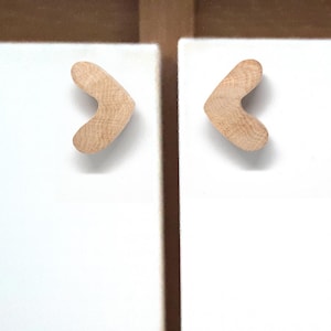 May include: Two white cabinet doors with wooden heart-shaped handles.