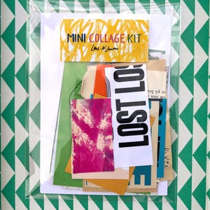 May include: A mini collage kit in a clear plastic sleeve. The kit includes various colorful paper scraps, including a piece with the word "LOST" in bold black letters. A yellow label with the text "MINI COLLAGE KIT" is visible. The background features a green and white geometric pattern.