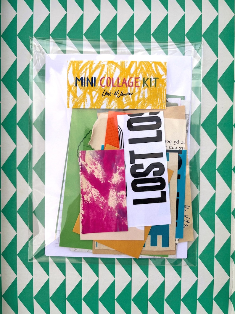 May include: A mini collage kit in a clear plastic sleeve. The kit includes various colorful paper scraps, including a piece with the word "LOST" in bold black letters. A yellow label with the text "MINI COLLAGE KIT" is visible. The background features a green and white geometric pattern.