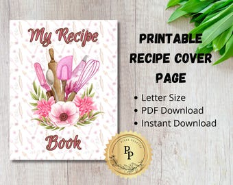 May include: Printable recipe cover page with a pink floral design and kitchen utensils. The text "My Recipe Book" is featured on the page.