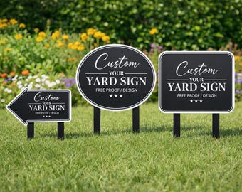 May include: Three black yard signs with white text. The left sign is arrow-shaped, the centre is oval, and the right is rectangular. All signs feature the text Custom YOUR YARD SIGN FREE PROOF / DESIGN with three stars below the text.