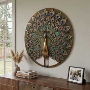 May include: A circular wall art piece featuring a three-dimensional bronze-toned peacock with an expansive, fanned tail. The feathers are detailed with teal and green accents and inlaid with small, circular, deep blue glass cabochons.