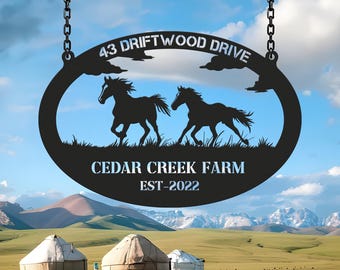 May include: Black metal sign with the text "43 DRIFTWOOD DRIVE" and "CEDAR CREEK FARM EST-2022". The sign features silhouettes of two running horses within an oval frame, hanging from chains.