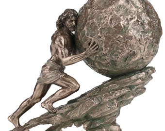 May include: A bronze-toned sculpture depicts a muscular figure pushing a large, textured sphere up a rocky incline. The figure, with long hair and a beard, is clad in a draped cloth. The sculpture has a weathered appearance, suggesting age and durability.
