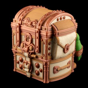 May include: A detailed, decorative treasure chest with a domed lid. The chest features a combination of cream, copper, and tan colors, with intricate hardware and a small attached bag. The design suggests a vintage or fantasy theme.