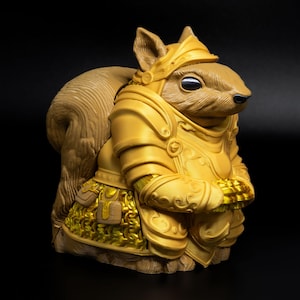 May include: A whimsical figurine of a squirrel wearing golden armor and a helmet. The squirrel has a brown body and tail, with the armor detailed with intricate designs. The figurine is set against a black background.