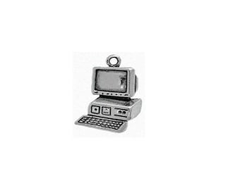 May include: A silver charm in the shape of a vintage computer. The charm has a monitor, keyboard, and a small hole at the top for attaching to a chain.