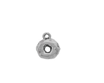 May include: Silver charm in the shape of a donut. The charm has a hole in the center and a textured surface.