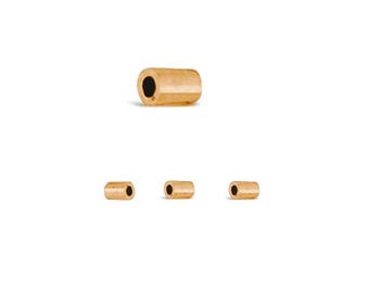 May include: Five gold-colored metal tube beads. The beads are about 1/2 inch long and have a small hole in the center.