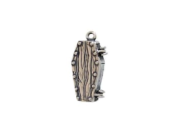 May include: Silver charm in the shape of a wooden coffin. The coffin has a detailed wood grain texture and metal accents.