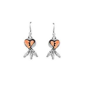 May include: Silver dangle earrings with a peach-colored heart charm with a crack down the middle. The heart charm is surrounded by small silver beads.