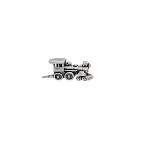 May include: A silver toy train with a black engine and a silver caboose. The train has four wheels and is made of metal.