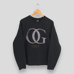 Vintage Obey Weltweit OG Logo Schwarzes Sweatshirt Obey Weltweit Crewneck Obey Werbung Pullover Obey Usa Streetwear Pullover Größe M