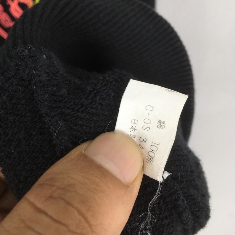 May include: A set of three ceramic mugs with a speckled, matte finish. The mugs are in shades of cream, light gray, and dark gray. Each mug has a simple, minimalist design, perfect for coffee or tea.