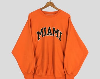 ヴィンテージ 90年代 マイアミ ハリケーンズ NCAA グリーン スウェット