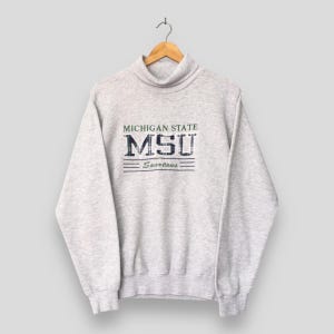 Sudadera vintage de la Universidad Estatal de Michigan, talla M, con bordado de los Michigan Spartans Football, jersey de cuello alto de la MSU Michigan State, talla M.