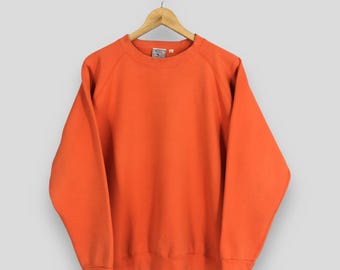Suéter naranja liso vintage de los años 90 de Avirex USAF, sudadera naranja grande de Avirex de la USAF, cuello redondo de Avirex de la Fuerza Aérea del Ejército de los Estados Unidos, talla L