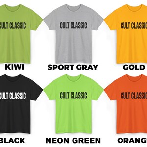 May include: Six t-shirts in different colors with the text "CULT CLASSIC" printed in black on the front. The colors are kiwi, sport gray, gold, black, neon green, and orange.
