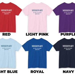 May include: A collection of six short-sleeved t-shirts in various colors: red, light pink, purple, light blue, royal blue, and navy. Each shirt features the text "MISSIONARY SO WE CAN KEEP ARGUING" in a contrasting color.