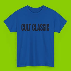 May include: A royal blue t-shirt with the text "CULT CLASSIC" printed in black.