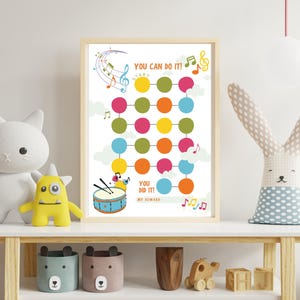 Puede incluir: Un gráfico colorido con un tema musical para niños. Presenta un gráfico circular con círculos coloridos conectados por líneas. El gráfico dice "You Can Do It!" y "You Did It! My Reward".