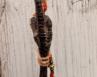 Gemummificeerde kippenpoot talisman