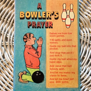 May include: A vintage print with a bowling theme, titled "A Bowler's Prayer." The image shows a cartoon figure kneeling in prayer, a bowling ball, and bowling pins. The text includes a prayer for good bowling scores.
