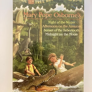 May include: A boxed set of Magic Tree House books #5-8 by Mary Pope Osborne. The cover features an illustration of two children in a boat near a large crocodile in a jungle setting, with titles Night of the Ninjas, Afternoon on the Amazon, Sunset of the Sabertooth, and Midnight on the Moon.