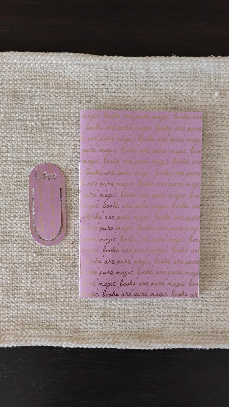 A handmade Bible study journal with a faith-inspired design. The cover features hand-lettered scripture, floral accents, and soft pastel tones. Inside, the journal includes lined, dotted, and blank pages for note-taking, prayer journaling, and reflection. Divider tabs help organize scripture studies, sermon notes, and daily devotions. Ideal for personal use or gifting, this thoughtful journal encourages spiritual growth and creativity.