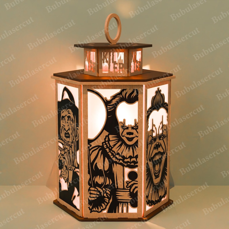 May include: A wooden Halloween lantern with a hexagonal shape. The lantern features cut-out images of horror characters and the word "KILLER". It has a wooden handle and is illuminated from within, creating a spooky glow.