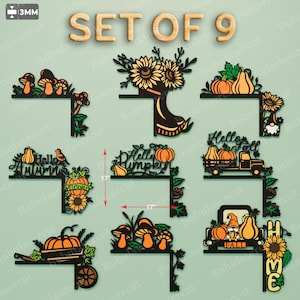 May include: A set of nine laser-cut wooden fall-themed decorations. Designs include pumpkins, sunflowers, mushrooms, and a truck. Each piece is approximately 17 inches in height. The text "SET OF 9" is visible at the top.