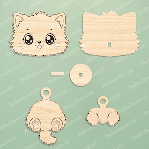 May include: A collection of wooden cat-themed craft pieces. Includes a cat face, a cat body, a tail, and other components. The pieces are designed to be assembled. The wood has a natural, unfinished appearance.