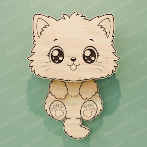 May include: Wooden cat-shaped cutout with a fluffy design. The cat has large, expressive eyes, a small nose, and a smiling mouth. The paws and tail are also visible. The cutout is made of light-colored wood.