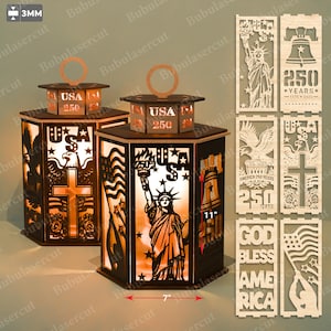 May include: Two wooden lanterns with laser-cut designs, featuring patriotic themes. Each lantern has a hexagonal shape, a handle, and the text "USA 250". The lanterns are approximately 7 inches wide and 11 inches tall. Additional cutouts are included.