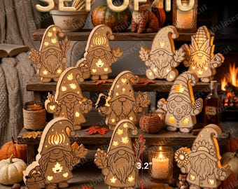 May include: A set of 10 laser-cut wooden gnome decorations, each featuring cutouts of leaves, pumpkins, and stars that glow with internal light. The figures measure 3.2 inches in height and 2.7 inches in width, arranged on a tiered display.
