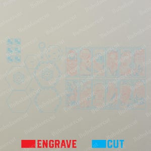 May include: A laser-cut design layout with various shapes and character portraits. The design includes the words "ENGRAVE" in red and "CUT" in blue, indicating the cutting and engraving processes.