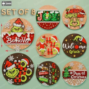 Puede incluir: Conjunto de 8 adornos navideños circulares de madera, cada uno de 30 cm de diámetro. Los diseños incluyen personajes de Grinch, copos de nieve y frases festivas como "Believe" y "Merry Grinchmas". Los adornos tienen 3 mm de grosor.