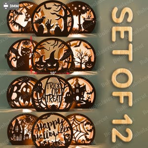 Puede incluir: Conjunto de 12 decoraciones de Halloween de madera cortadas con láser. Cada diseño circular presenta siluetas espeluznantes de calabazas, fantasmas y casas embrujadas. El más grande tiene 25,4 cm de diámetro. El texto "Trick or Treat" y "Happy Halloween" es visible.