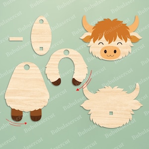 May include: Wooden Highland cow craft kit with separate pieces for assembly. The kit includes the cow's head, body, legs, and horns. The cow's face has a light brown nose and a smiling mouth. The horns and legs are brown.