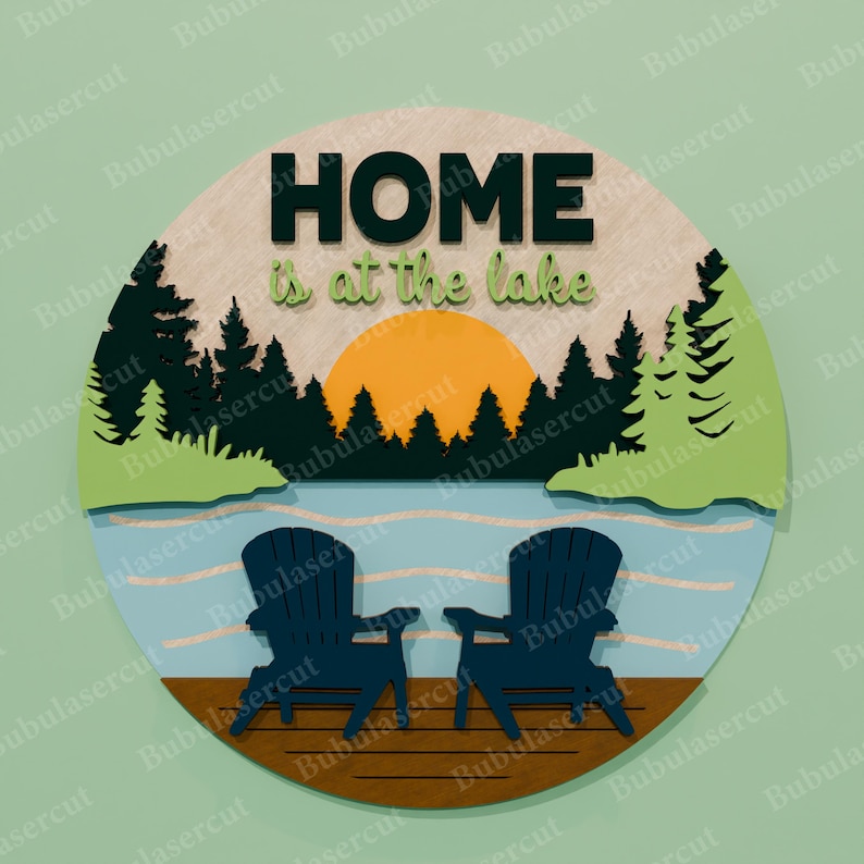 May include: A round wooden sign with a lake scene. The sign features two blue Adirondack chairs on a dock, a lake, trees, and a sunset. The words "HOME is at the lake" are displayed.