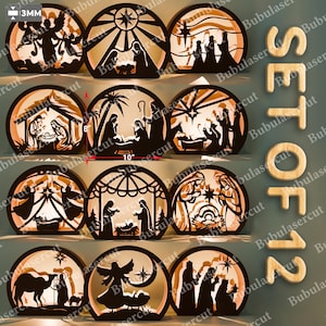 May include: A set of 12 laser-cut wooden Christmas ornaments. Each ornament is a half-circle design with a silhouette scene of the Nativity. The ornaments are approximately 10 inches wide and 8 inches tall, with a 3mm thickness. The text "SET OF 12" is visible.