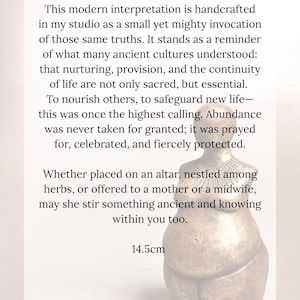 May include: A bronze-colored, acorn-shaped sculpture with the text "Venus Keeper of the Ancient Pulse." The sculpture is 14.5 cm tall. The text describes the sculpture's purpose and meaning.