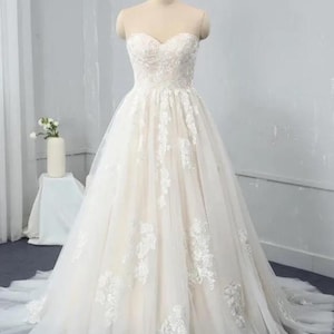 Champagne Off-Shoulder Ball Gown: Lace Appliqué Wedding Dress