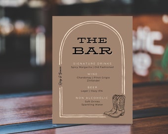 May include: A brown sign with a white archway and the text "THE BAR" in black. The sign lists signature drinks, wine, beer, and non-alcoholic options. There are two drawings of cowboy boots at the bottom of the sign.
